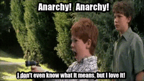 Boy Holding Gun With Anarchy GIF