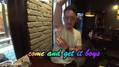 Boy Holding Hose In Grass GIF