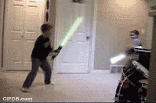 Boy Holding Light Saber GIF