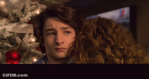 Boy Hugging Woman Saying Excuse Me GIF
