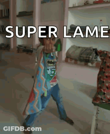 Boy In Batman Shirt With Super Lame Sign GIF
