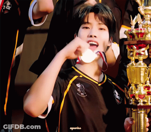 Boy In Black And Yellow Shirt Saying Aquarius GIF