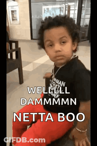 Boy In Black Shirt And Red Pants Making Face GIF