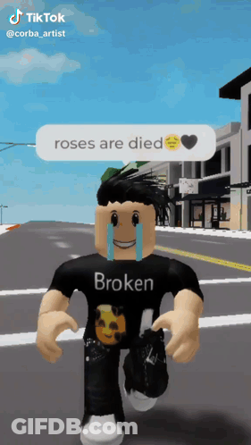 Boy In Black Shirt Saying Broken Walking Down Street GIF