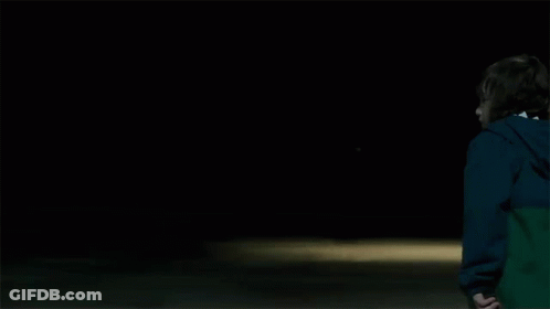 Boy In Blue Jacket Holding Hockey Stick GIF