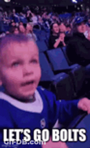 Boy In Blue Jersey Sitting In Stadium GIF