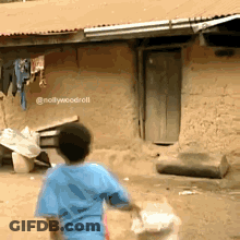 Boy In Blue Shirt Holding Bag GIF