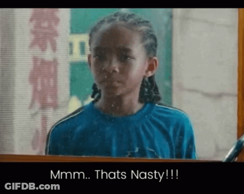 Boy In Blue Shirt Looking In Mirror Saying Mmm Thats Nasty GIF
