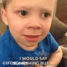 Boy In Blue Shirt Making Funny Face GIF
