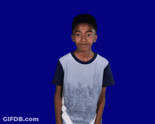 Boy In Blue Shirt Making Funny Face Saying What GIF