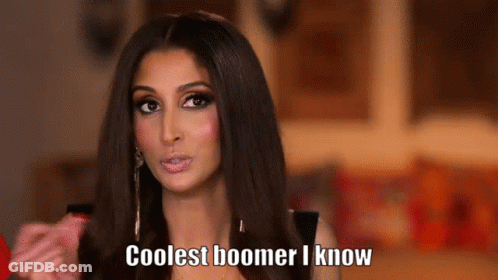 Boy In Blue Shirt Saying Purple Ok Boomer GIF
