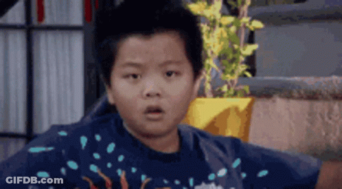 Boy In Blue Shirt Surprised GIF