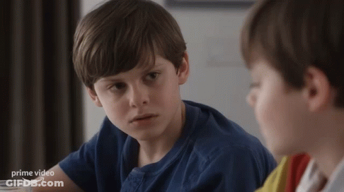 Boy In Blue Shirt Talking To Friend GIF