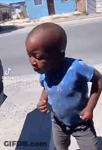 Boy In Blue Shirt Walking GIF