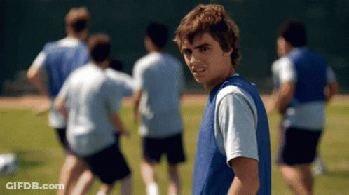Boy In Blue Vest With Soccer Team GIF