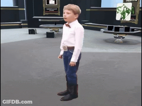 Boy In Bow Tie Standing In Room GIF