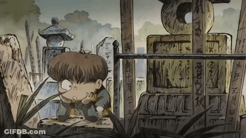 Boy In Cemetery With Chinese Writing GIF
