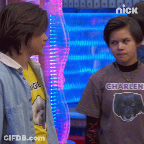 Boy In Charlen Shirt Next To Boy In Yellow Shirt GIF