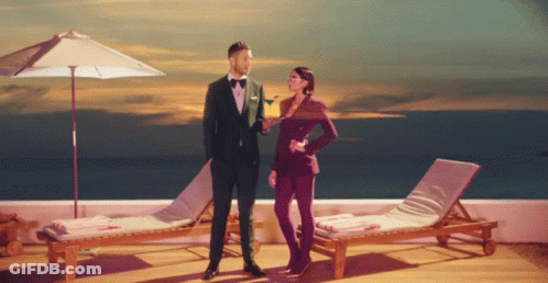 Boy In Cowboy Boots And Bow Tie Standing In Store GIF