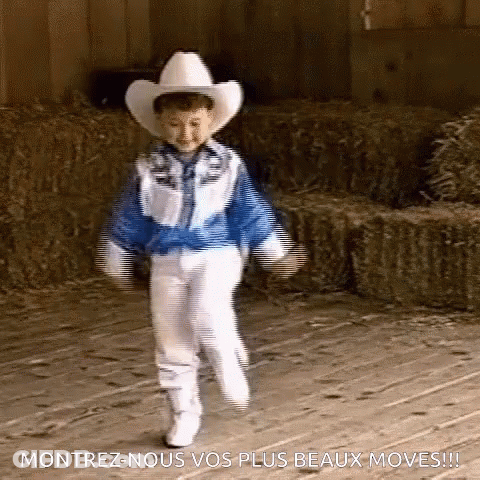 Boy In Cowboy Hat And Blue Jacket GIF
