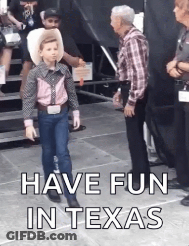 Boy In Cowboy Outfit Next To Man In Plaid Shirt GIF