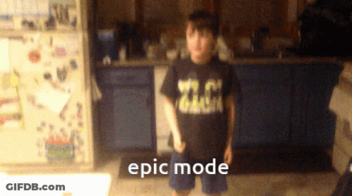 Boy In Epic Mode Shirt In Kitchen GIF