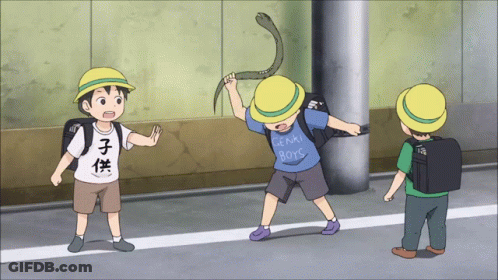 Boy In Genki Boys Shirt Holding Snake GIF