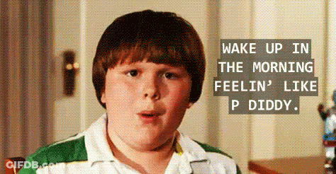 Boy In Green And White Shirt Sitting At Table With Quote GIF