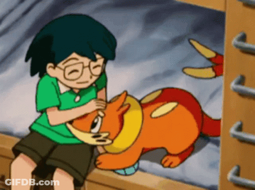 Boy In Green Shirt Petting Cartoon Animal GIF