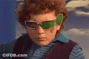 Boy In Green Sunglasses And Blue Shirt GIF