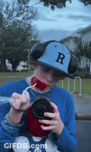 Boy In Hat With Letter R GIF