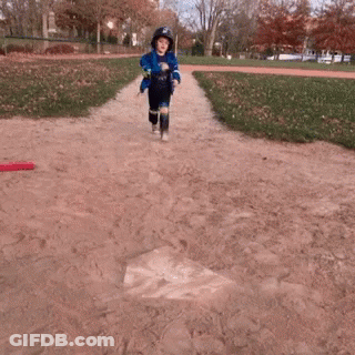 Boy In Helmet And Blue Jacket Playing Baseball GIF