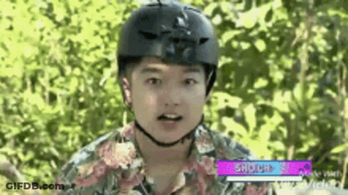 Boy In Helmet And Hawaiian Shirt GIF