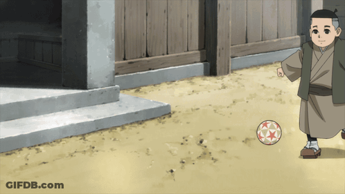 Boy In Kimono Kicking A Ball GIF