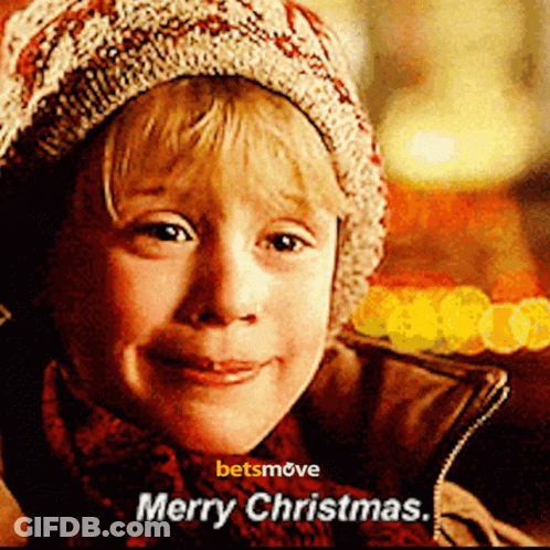 Boy In Knitted Hat And Scarf Merry Christmas GIF
