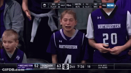 Boy In Northwestern Jersey Crying During Basketball Game GIF