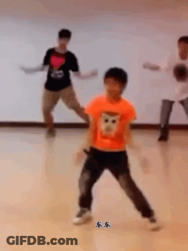 Boy In Orange Shirt With Monkey Face GIF