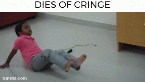 Boy In Pink Shirt Laying On Floor Dies Of Cringe GIF