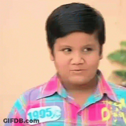 Boy In Plaid Shirt Making Funny Face GIF