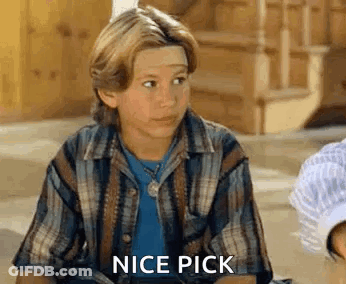 Boy In Plaid Shirt Sitting On Ground GIF