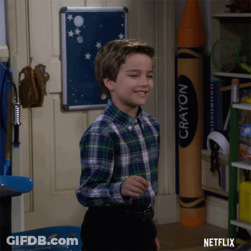 Boy In Plaid Shirt Standing Before Crayon GIF