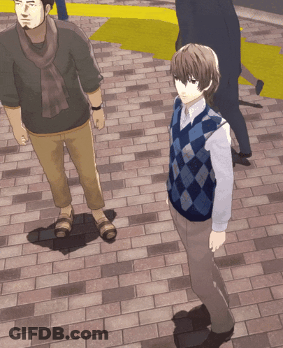 Boy In Plaid Vest On Brick Walkway GIF