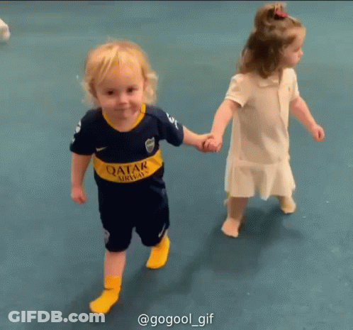 Boy In Qatar Airways Jersey Holding Hands With Little Girl GIF
