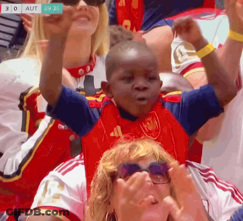 Boy In Red And Blue Shirt Number 41 Arms Up GIF