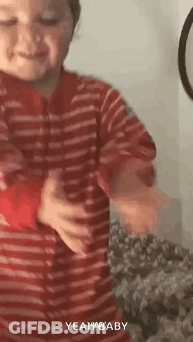 Boy In Red And White Striped Shirt Dancing GIF