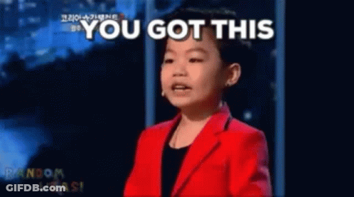 Boy In Red Jacket Standing In Front Of You Got This Sign GIF