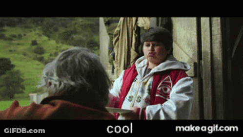 Boy In Red Jacket Talking To Older Man GIF