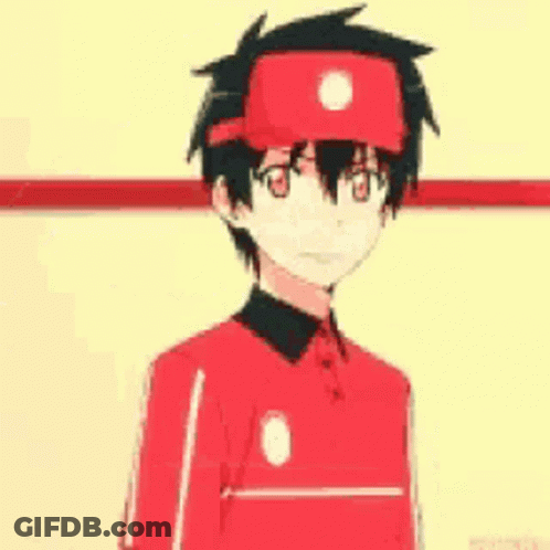 Boy In Red Shirt And Hat Standing Before Yellow Wall GIF