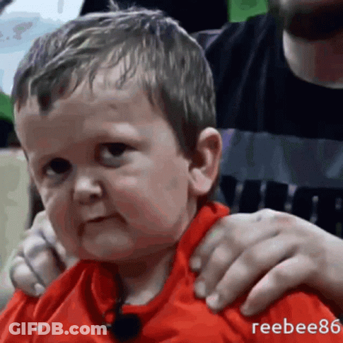 Boy In Red Shirt Being Shaved GIF