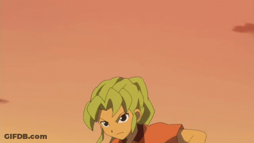 Boy In Red Shirt Kicking Soccer Ball GIF
